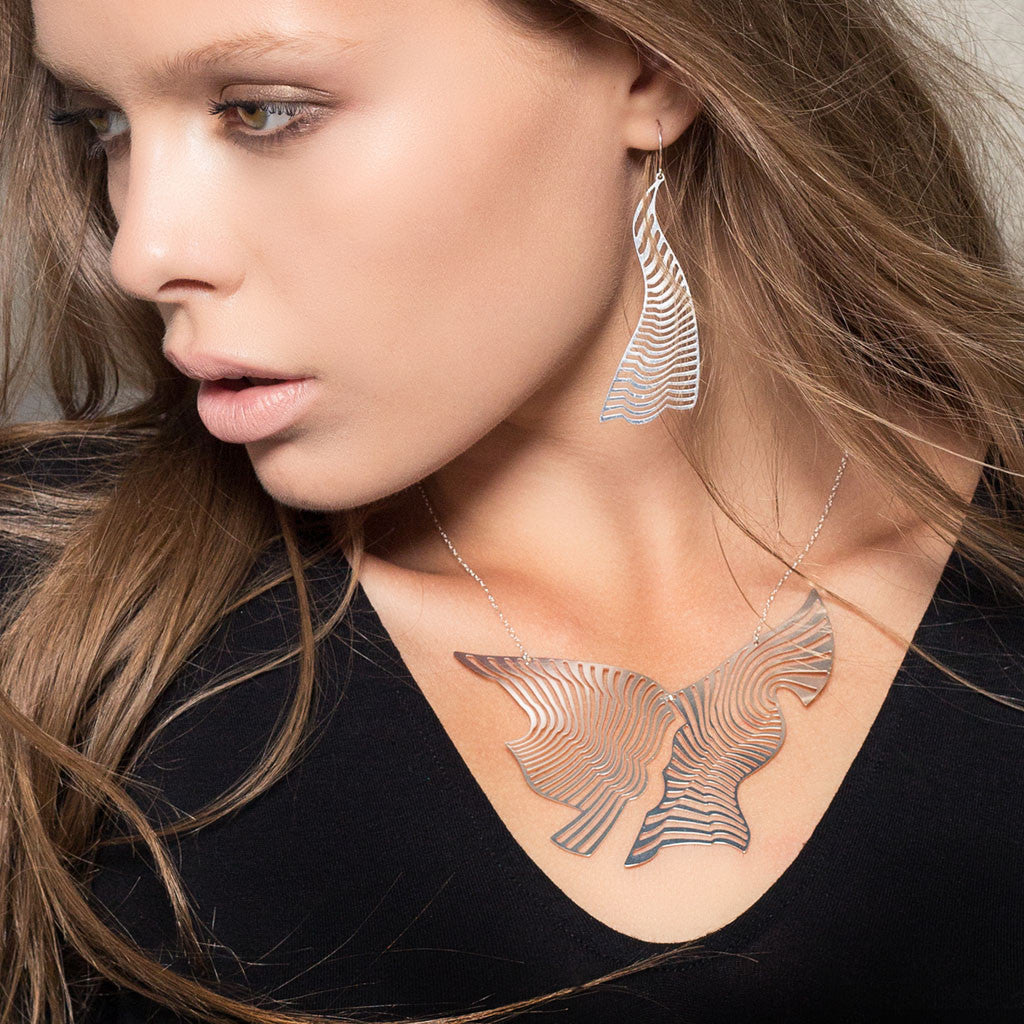 Noor fares fly me 2025 to the moon earrings